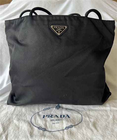 prada raffia tote bag black|prada nylon zip tote.